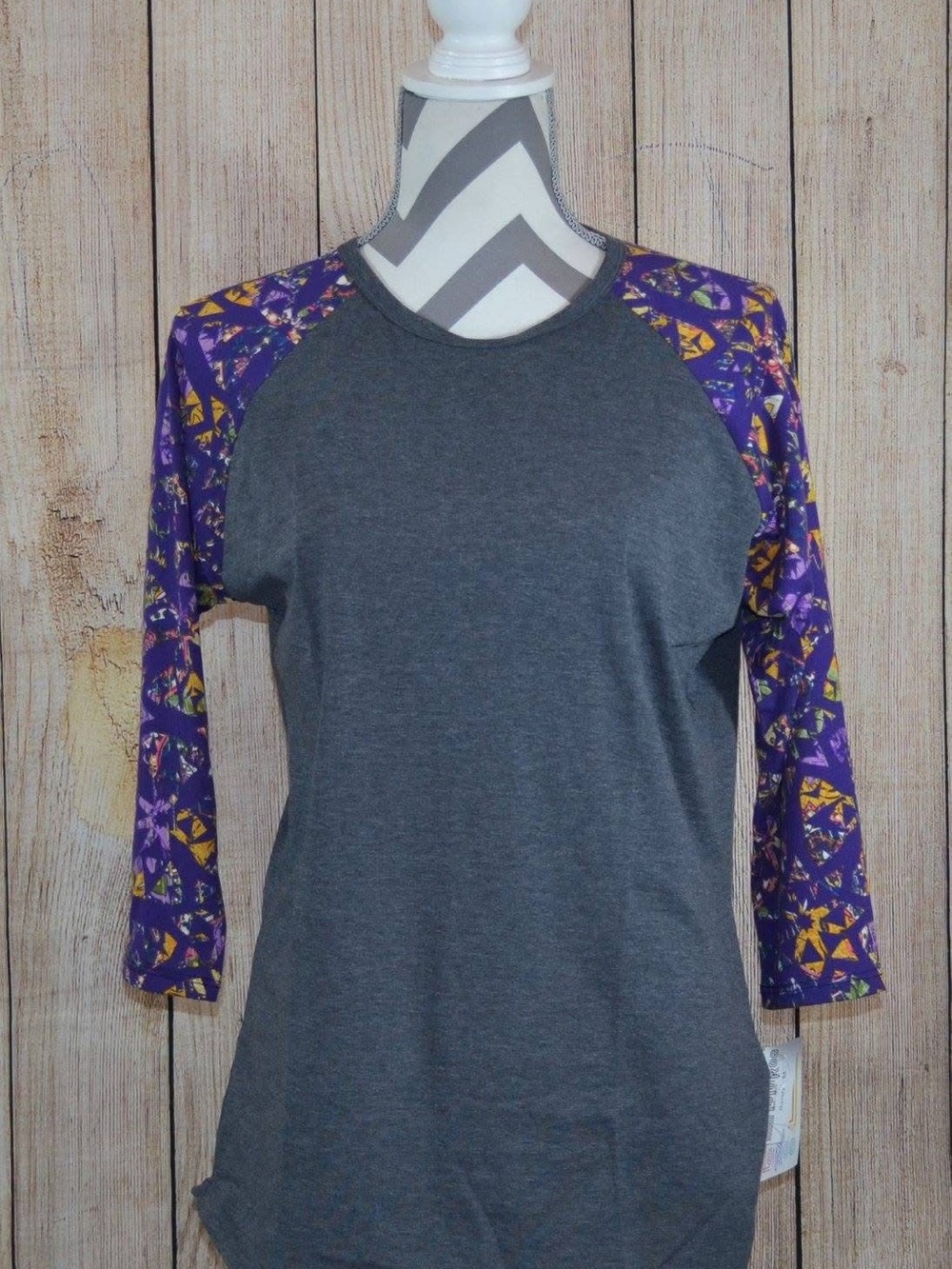 LuLaRoe Randy Charcoal Grey Raglan with Purple & Gold Patterned Sleeves